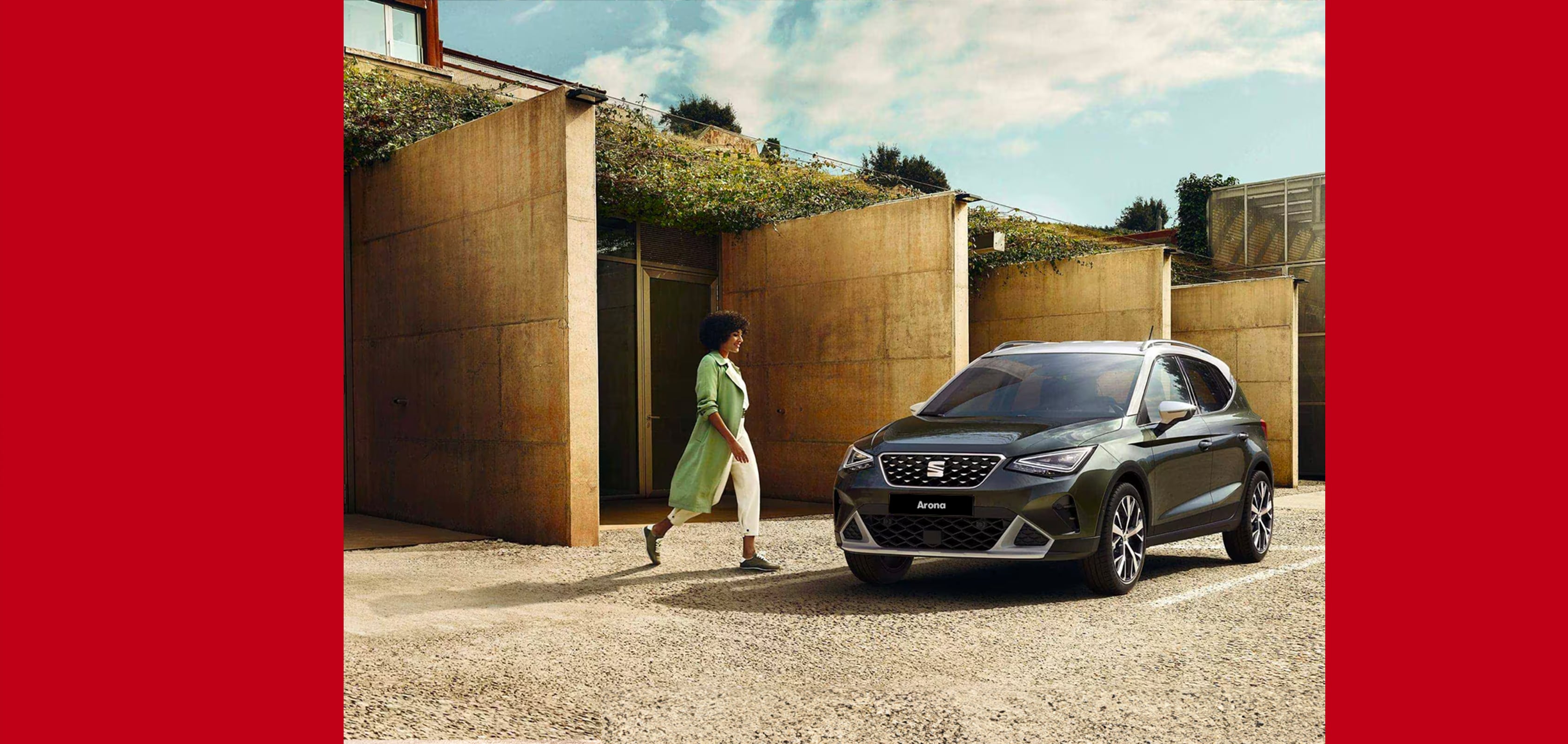 SEAT new car services – Woman stepping out of a car hair blowing
