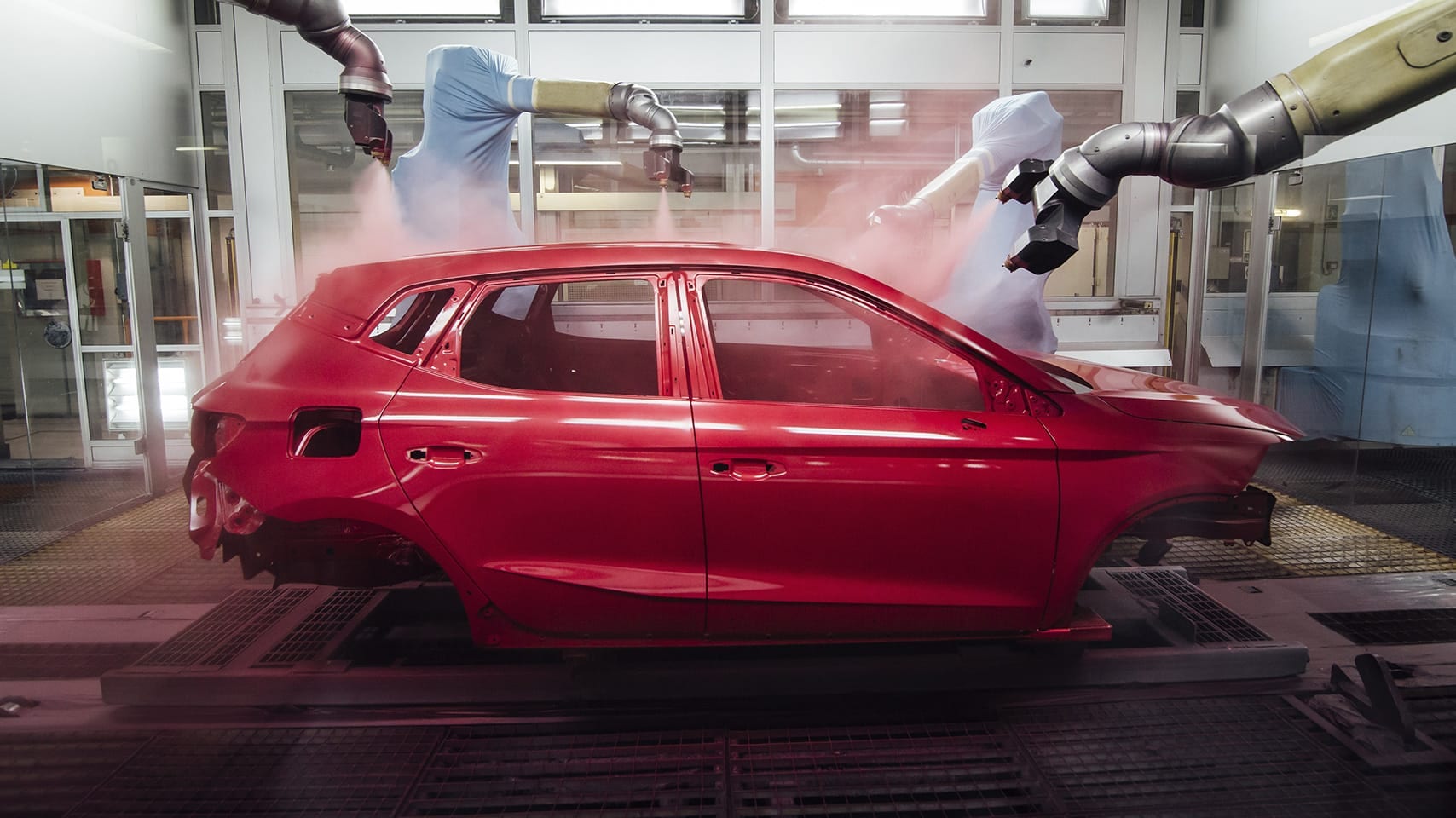 SEAT model being painted in red